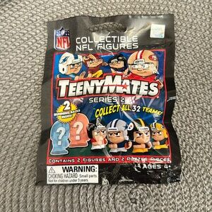 Never opened. NFL collectible figures. Teenymates